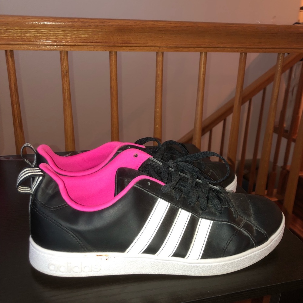 black white and pink adidas sneakers